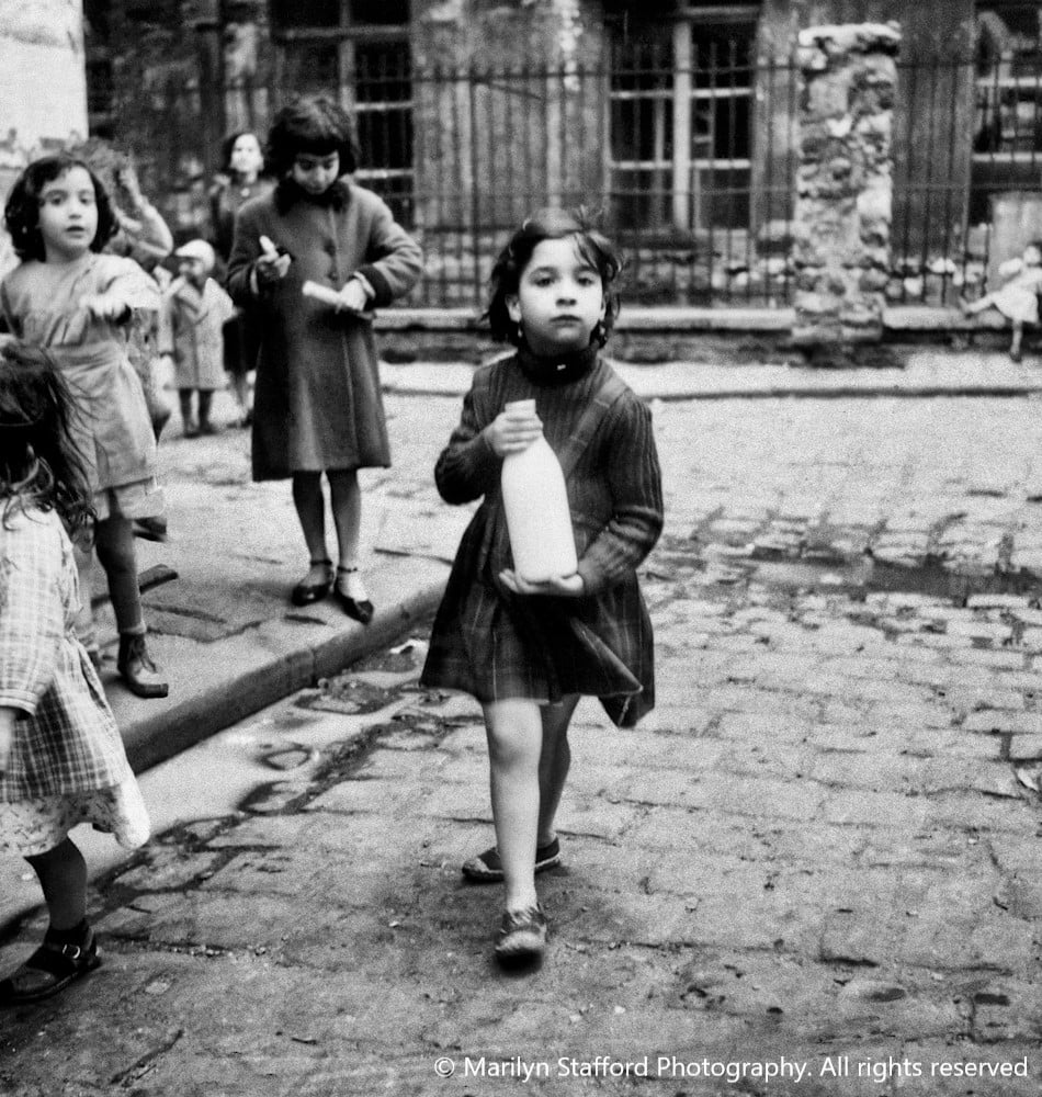 Girl with milk bottle Paris 1950